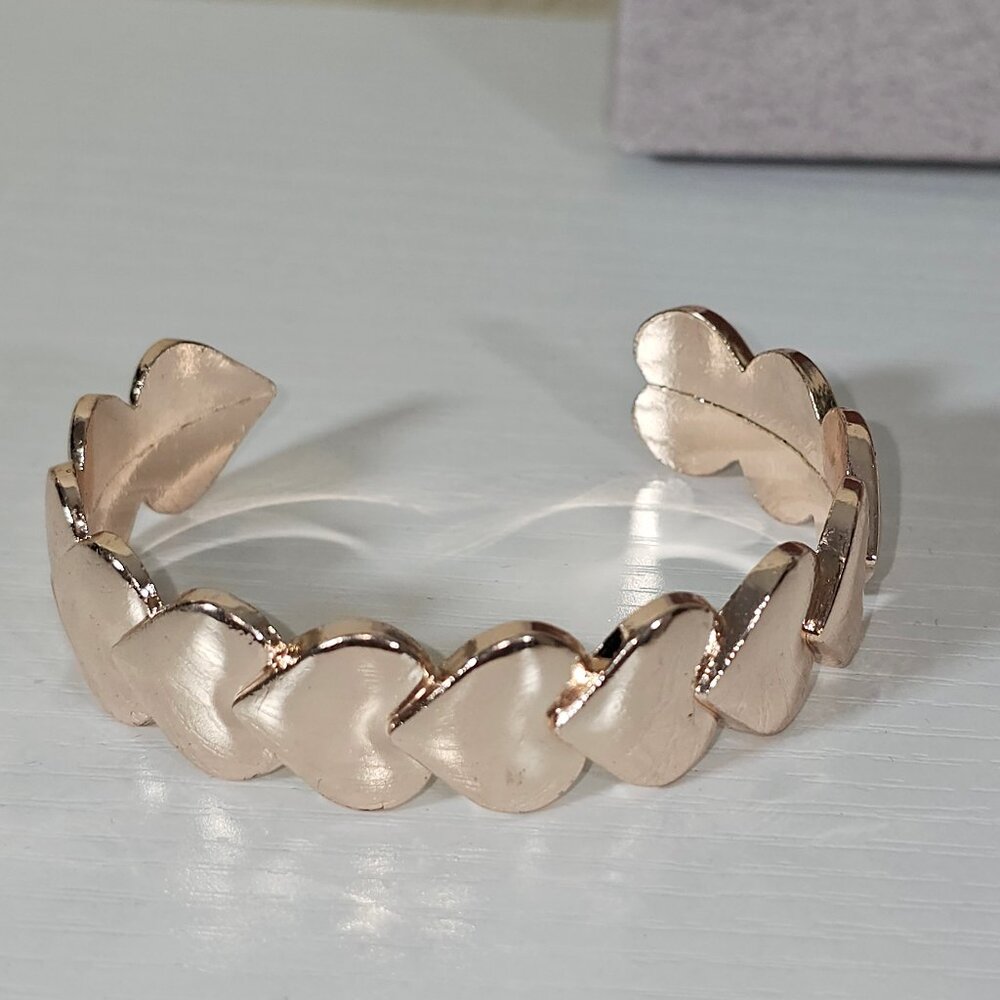 Gold Tone Cuff Bracelet with Hearts